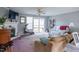 Comfortable living room features a fireplace, plush seating, and access to the backyard at 764 Olivers Grove Rd, Four Oaks, NC 27524