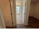 A bedroom entrance showing carpeted floors and an abundance of natural light at 798 Old Station Pointe, Angier, NC 27501