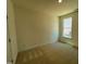 Comfortable bedroom with plush carpeting and a large sunny window at 798 Old Station Pointe, Angier, NC 27501