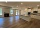 Open floor plan featuring a gourmet kitchen and a view of the living area at 798 Old Station Pointe, Angier, NC 27501