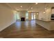 Open floor plan with fireplace and island with granite countertops at 798 Old Station Pointe, Angier, NC 27501