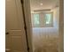 View of the main bedroom featuring neutral carpet and a tray ceiling at 798 Old Station Pointe, Angier, NC 27501