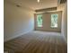 Spacious main bedroom featuring a trey ceiling and plush carpeting at 798 Old Station Pointe, Angier, NC 27501