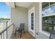 Charming balcony featuring a chair and railing offering a cozy outdoor relaxation spot at 9120 Dupree Meadow Dr, Angier, NC 27501