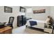 Comfortable bedroom featuring a desk and drawers plus a TV mounted on the wall at 9120 Dupree Meadow Dr, Angier, NC 27501