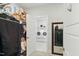A closet and laundry room showing ample storage space and a convenient laundry area at 9120 Dupree Meadow Dr, Angier, NC 27501