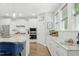 Bright kitchen features granite countertops, stainless steel appliances, and white cabinetry at 9120 Dupree Meadow Dr, Angier, NC 27501