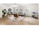 Bright living space with hardwood floors, stylish decor, and natural light from multiple windows at 939 Clarion Dr, Durham, NC 27705
