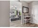 Bright living room featuring hardwood floors, gray sofa and natural light at 100 Arrowtown Way, Kenly, NC 27542