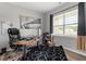 Comfortable office space with natural light, a desk, and a black accent rug at 100 Arrowtown Way, Kenly, NC 27542