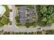 Aerial shot showcasing the neighborhood's layout, well-maintained streets, and manicured landscaping at 100 Tobacco Leaf Ln, Apex, NC 27502