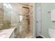 Bathroom showcasing a glass door shower with a rainfall shower head and tiled walls at 100 Tobacco Leaf Ln, Apex, NC 27502