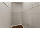 Walk-in closet featuring wire shelving and hardwood floors, perfect for organizing clothes and accessories at 100 Tobacco Leaf Ln, Apex, NC 27502