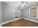 Bedroom featuring hardwood floors, ample natural light, and neutral colored walls at 1022 Dorothea Dr, Raleigh, NC 27603