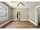 Bedroom featuring hardwood floors, ample natural light, and neutral colored walls at 1022 Dorothea Dr, Raleigh, NC 27603