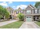 Charming townhome featuring a driveway and attached garage nestled in a well-maintained neighborhood at 103 Ransomwood Dr, Apex, NC 27539