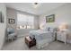 Serene bedroom with a soft color scheme, comfortable furniture, and charming decorative accents at 10310 Sablewood Dr # 211, Raleigh, NC 27617