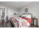 Comfortable bedroom with stylish decor and a view into another room at 10310 Sablewood Dr # 211, Raleigh, NC 27617