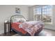Bright bedroom with a large window offering plenty of natural light at 10310 Sablewood Dr # 211, Raleigh, NC 27617