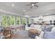 Bright living room and kitchen, plenty of natural light from the many windows at 10310 Sablewood Dr # 211, Raleigh, NC 27617