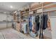 Spacious walk-in closet with custom shelves and ample storage for clothes and accessories at 10310 Sablewood Dr # 211, Raleigh, NC 27617