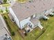 Aerial view of a community highlighting a private backyard with patio and a fenced-in yard at 1038 Felman Rd, Durham, NC 27703