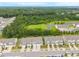 Desirable community close to wooded area, featuring charming townhomes with attached garages and well-maintained lawns at 1038 Felman Rd, Durham, NC 27703