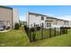 Spacious backyard with fenced-in yard and patio area, great for relaxing outdoors and entertaining at 1038 Felman Rd, Durham, NC 27703