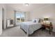 Bedroom with natural light and an accent mirror at 1038 Felman Rd, Durham, NC 27703