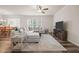 A living room featuring a comfortable sectional sofa and a media center at 1038 Felman Rd, Durham, NC 27703