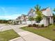 Street view of townhomes with manicured lawns and curb appeal offering a welcoming community at 1038 Felman Rd, Durham, NC 27703