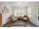 A sun room featuring natural light and comfortable seating at 1038 Felman Rd, Durham, NC 27703