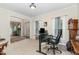 Office space with neutral walls, natural light, and space for a work area at 105 Acorn Ridge Ln, Holly Springs, NC 27540