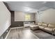Home theater with projector, large seating area and stylish flooring at 105 Otter Dr, Cary, NC 27513