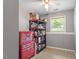 Finished storage room with organization shelving and natural light coming through window at 105 Otter Dr, Cary, NC 27513