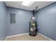 Utility room with water heater, ceramic tile flooring, neutral walls and electrical panel at 105 Otter Dr, Cary, NC 27513