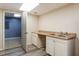 Wet bar features dual sinks and a large countertop at 105 Otter Dr, Cary, NC 27513