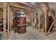 Spacious unfinished attic space with exposed wood beams, offering potential for customization and extra storage at 1120 Hooper Pl, Durham, NC 27703