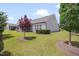 Expansive backyard with lush green lawn and mature trees, offering a peaceful and private outdoor space at 1120 Hooper Pl, Durham, NC 27703