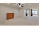 Large bonus room with ample space, a ceiling fan, and access to other areas of the house at 1120 Hooper Pl, Durham, NC 27703