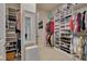 Spacious walk-in closet with custom shelving and ample storage space for clothing and accessories at 1120 Hooper Pl, Durham, NC 27703