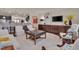 Comfortable living room with white sofas, dark wood accents, and an open layout at 1120 Hooper Pl, Durham, NC 27703