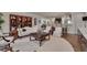 Open-concept living room with hardwood floors and seamless flow to the kitchen area at 1120 Hooper Pl, Durham, NC 27703