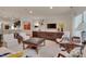 Cozy living space featuring plush seating, a media center, and stylish decor at 1120 Hooper Pl, Durham, NC 27703
