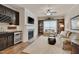 Cozy living room featuring a fireplace, built-in shelving with a wet bar, and an open layout at 1120 Hooper Pl, Durham, NC 27703