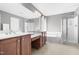 Large primary bathroom featuring double sink vanity, soaking tub, and walk-in shower at 1201 Somers Dr, Morrisville, NC 27560