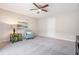 Cozy bedroom area with chair, end table, and large window at 1201 Somers Dr, Morrisville, NC 27560