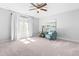 Bedroom featuring ample natural light, neutral walls, and chair at 1201 Somers Dr, Morrisville, NC 27560