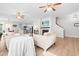Spacious living room with fireplace that opens to the kitchen and dining area at 1201 Somers Dr, Morrisville, NC 27560