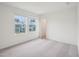 Light and airy bedroom featuring bright windows and plush carpet at 1212 Solace Way, Rolesville, NC 27571